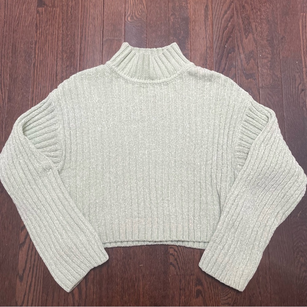 Light green turtleneck sweater
